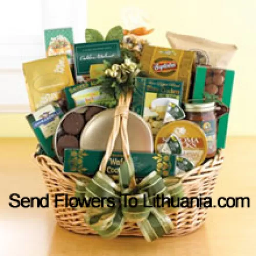 Start a tradition of sending good taste to everyone on your holiday gift list this year. Our classic wicker basket comes piled high with a gourmet assortment that is sure to please. Whether you need something to send to corporate clients or your favorite aunt and uncle, this gift basket is up to the job. We accent the basket with green and gold ribbon and holiday accents to make a great impression. Inside your recipients will discover an assortment that features something for everyone: Lindt chocolate truffles, smoked almonds, walnut cookies, chocolate cookies, chocolate-covered popcorn, cheese, crackers, a Ghirardelli chocolate bar, tortilla chips, salsa, chocolate wafer cookies , cheese swirls, and chocolate-covered sandwich cookies. (Please Note That We Reserve The Right To Substitute Any Product With A Suitable Product Of Equal Value In Case Of Non-Availability Of A Certain Product)