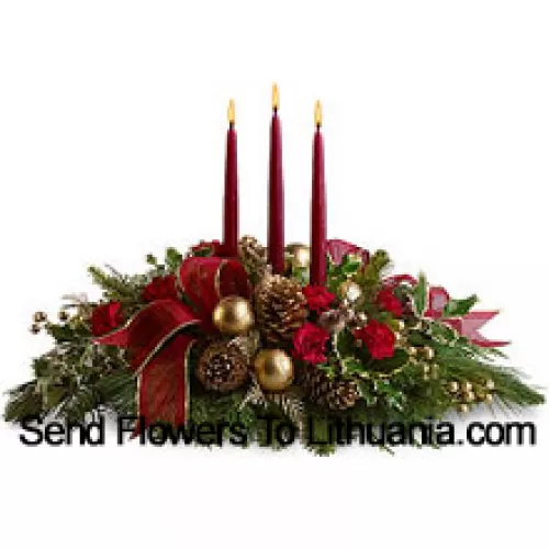 Red miniature carnations, pinecones, golden ornament balls, faux berries and assorted fresh evergreens  accented with a wired ribbon are arranged in a low dish with three red taper candles. (Please Note That We Reserve The Right To Substitute Any Product With A Suitable Product Of Equal Value In Case Of Non-Availability Of A Certain Product)